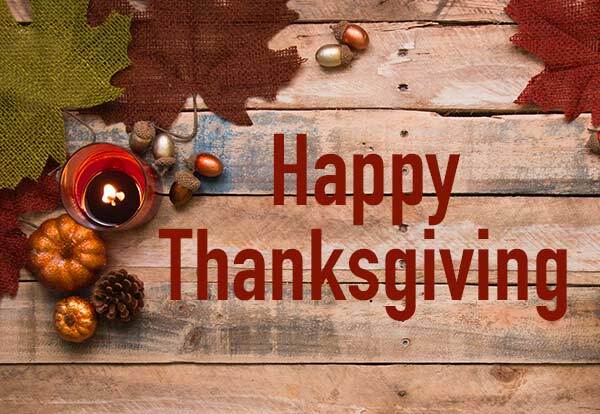 Happy Thanksgiving banner on leaf and pumpkin background